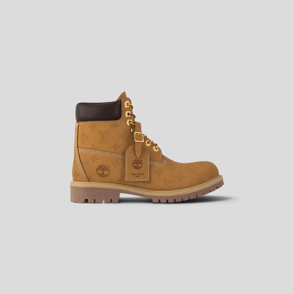 CLB XXIII Louis Vuitton x Timberland 6-inch wheat nubuck leather ankle boot with Monogram embossing and gold eyelets.