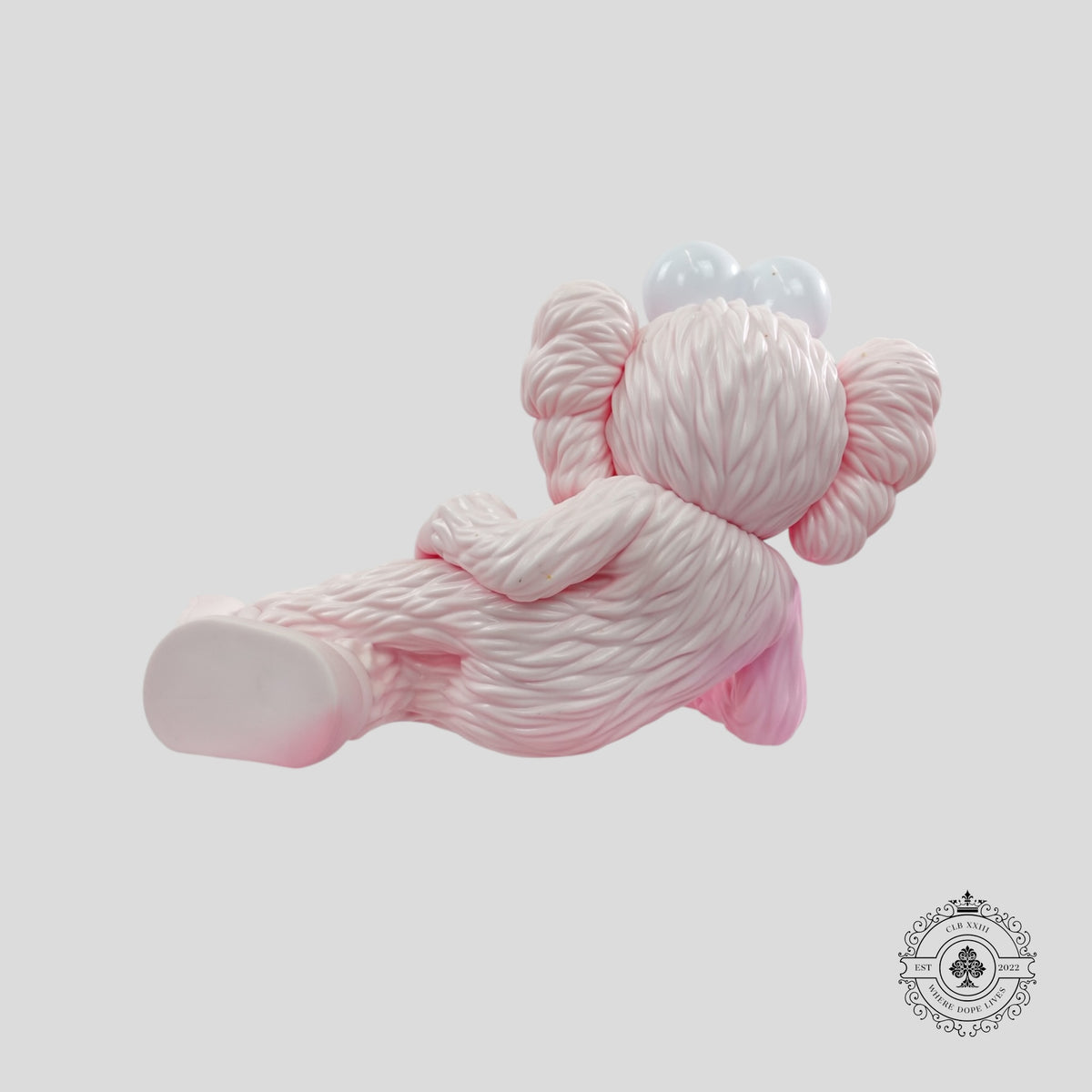 Kaws Time Off Vinyl Figure in Pink