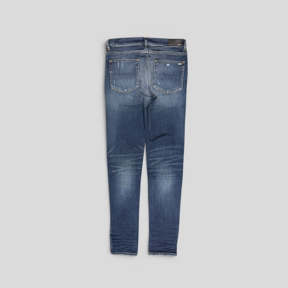 Amiri MX1 Leather Patch Jeans in Deep Classic Wash