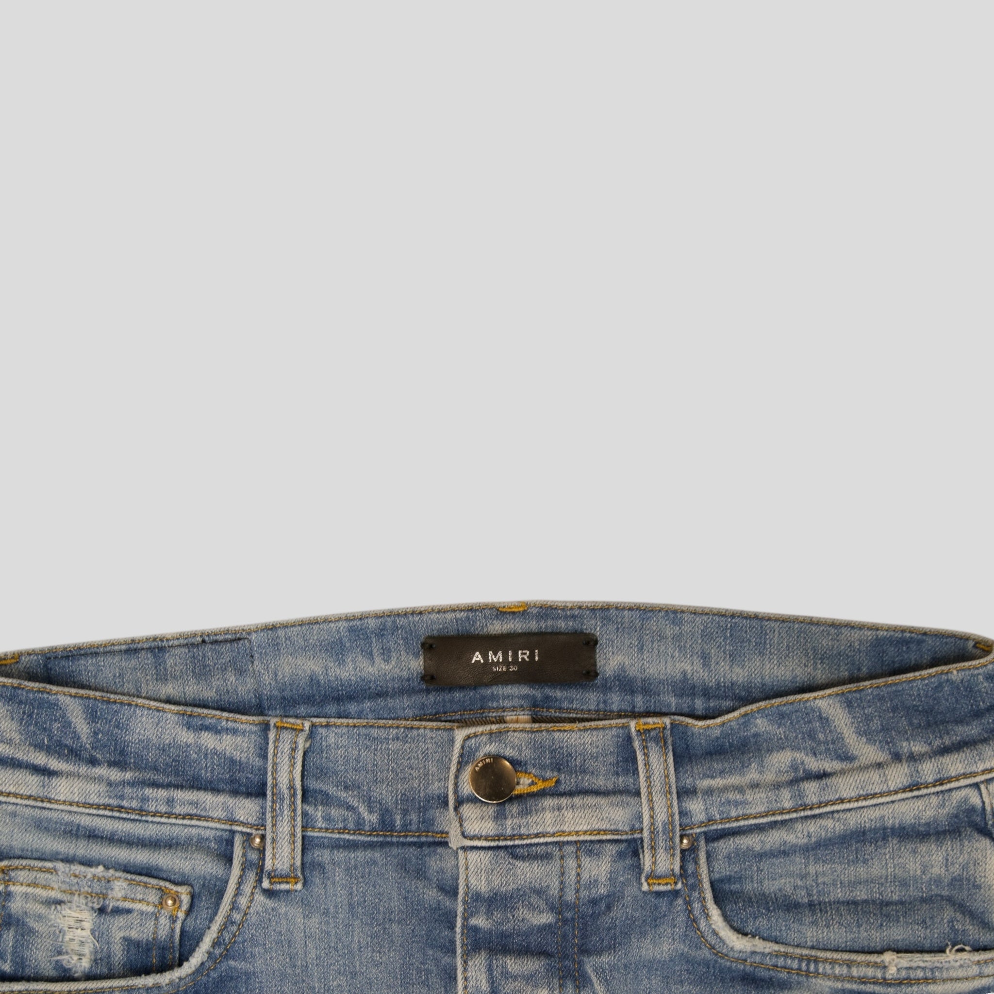 Amiri MX1 Leather Patch Jeans in Light Indigo