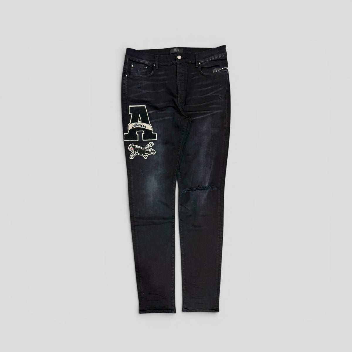 Amiri Varsity Patch Jeans in Aged Black
