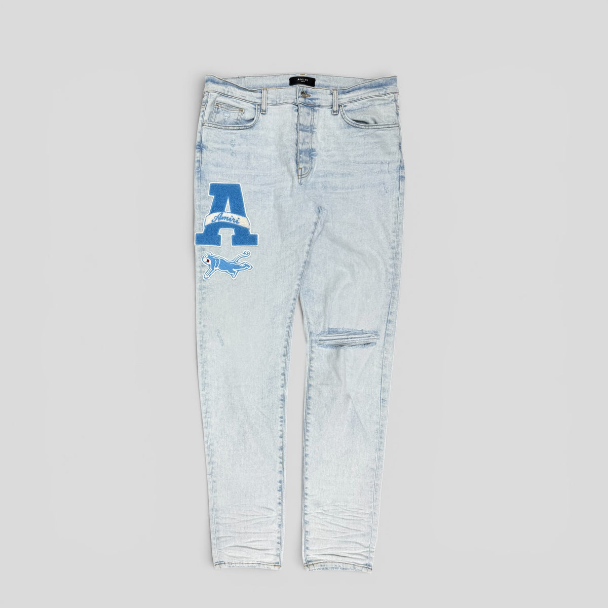 Amiri Varsity Patch Jeans in Vintage Sky Indigo