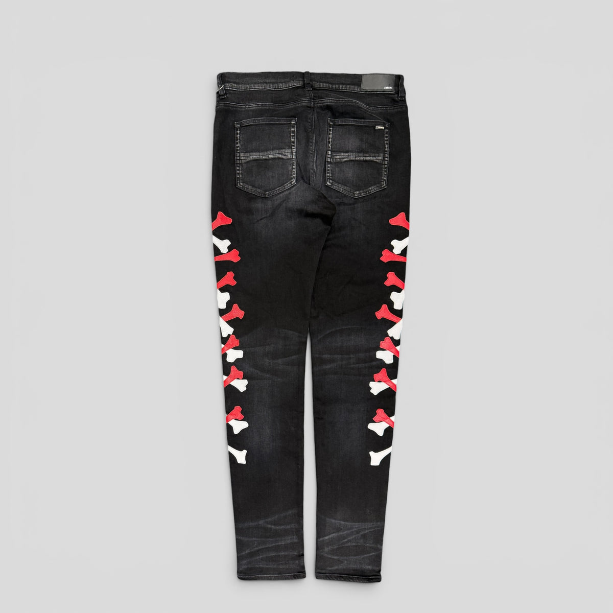 Amiri Red White Bones Jeans in Aged Black