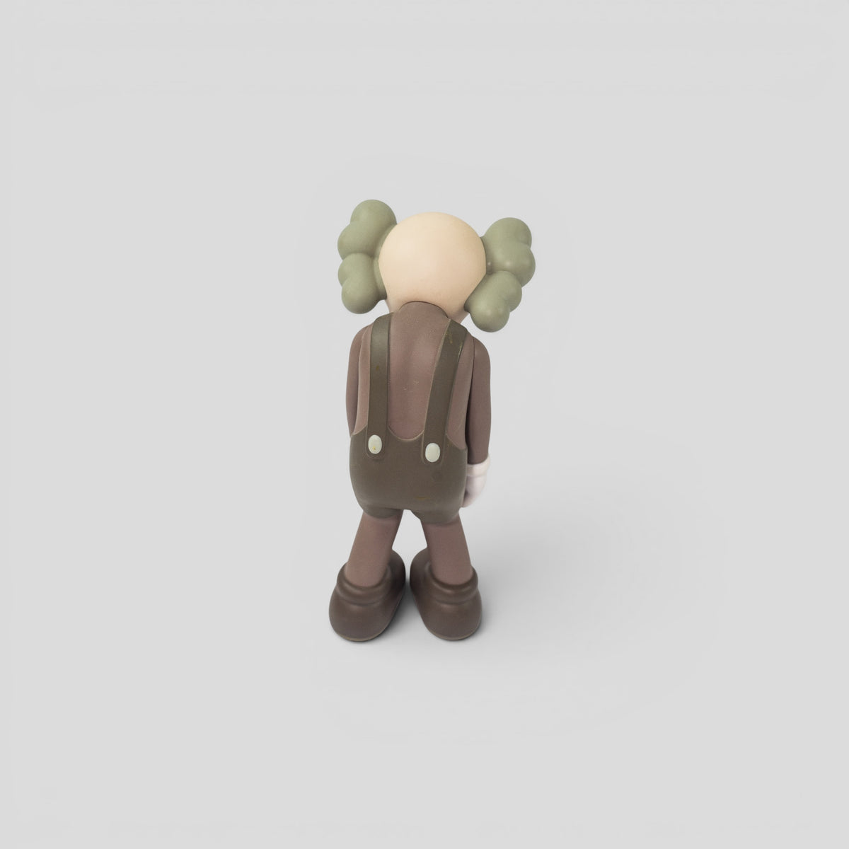 Kaws Small Lie Companion Vinyl Figure in Brown