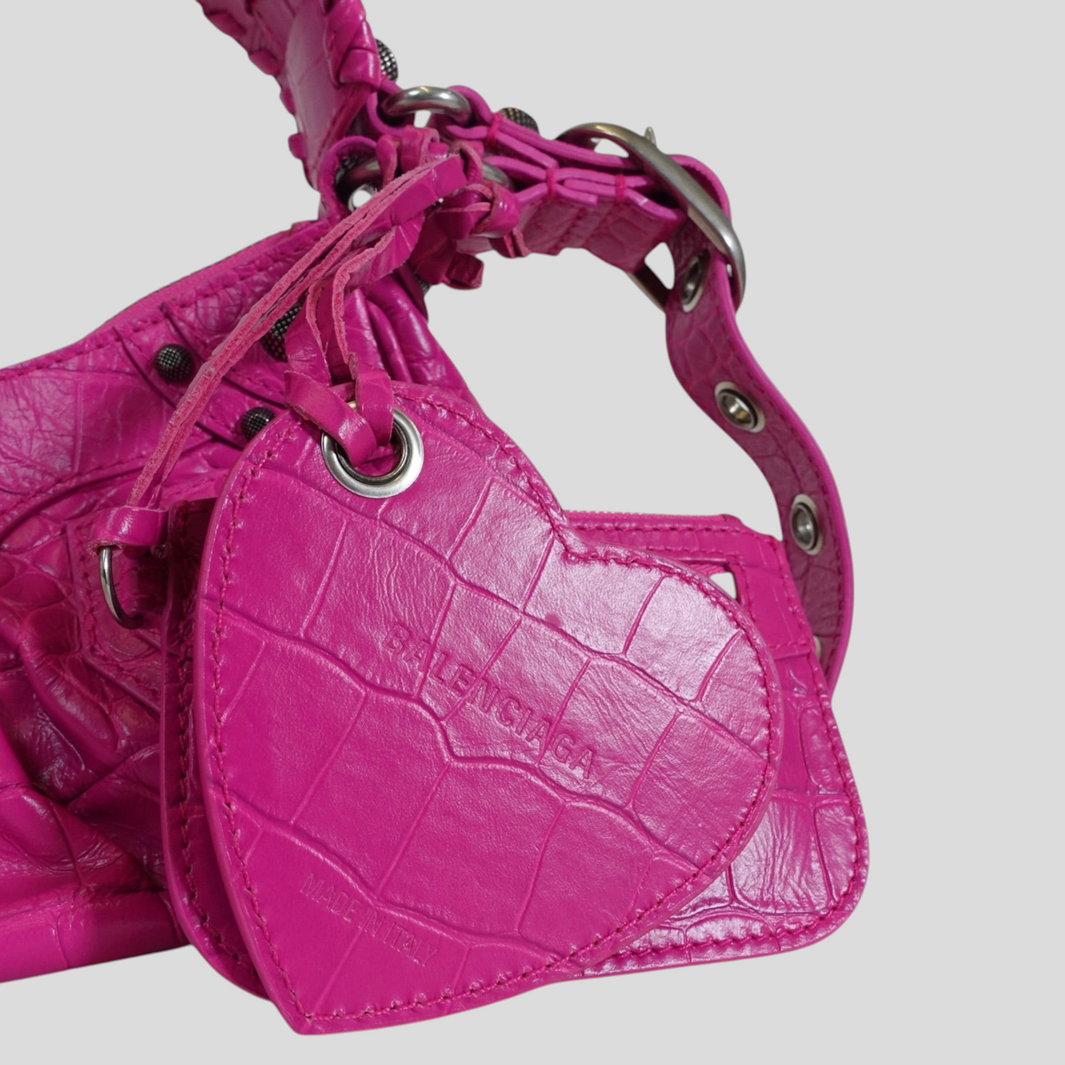 CLB XXIII Balenciaga Le Cagole XS shoulder bag in bright pink crocodile-embossed leather with heart-shaped mirror tag