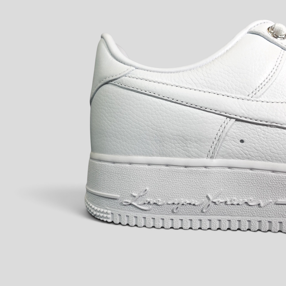 CLB XXIII Chrome Hearts X Nocta white leather Air Force 1 Low sneaker featuring Love You Forever script on the midsole
