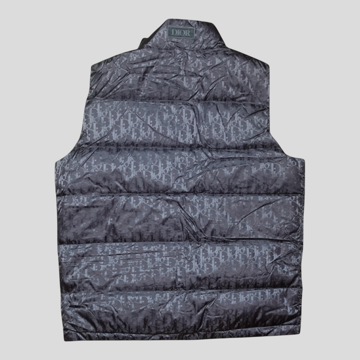 CLB XXIII Dior Oblique padded vest jacket in grey featuring the iconic monogram pattern and a high collar