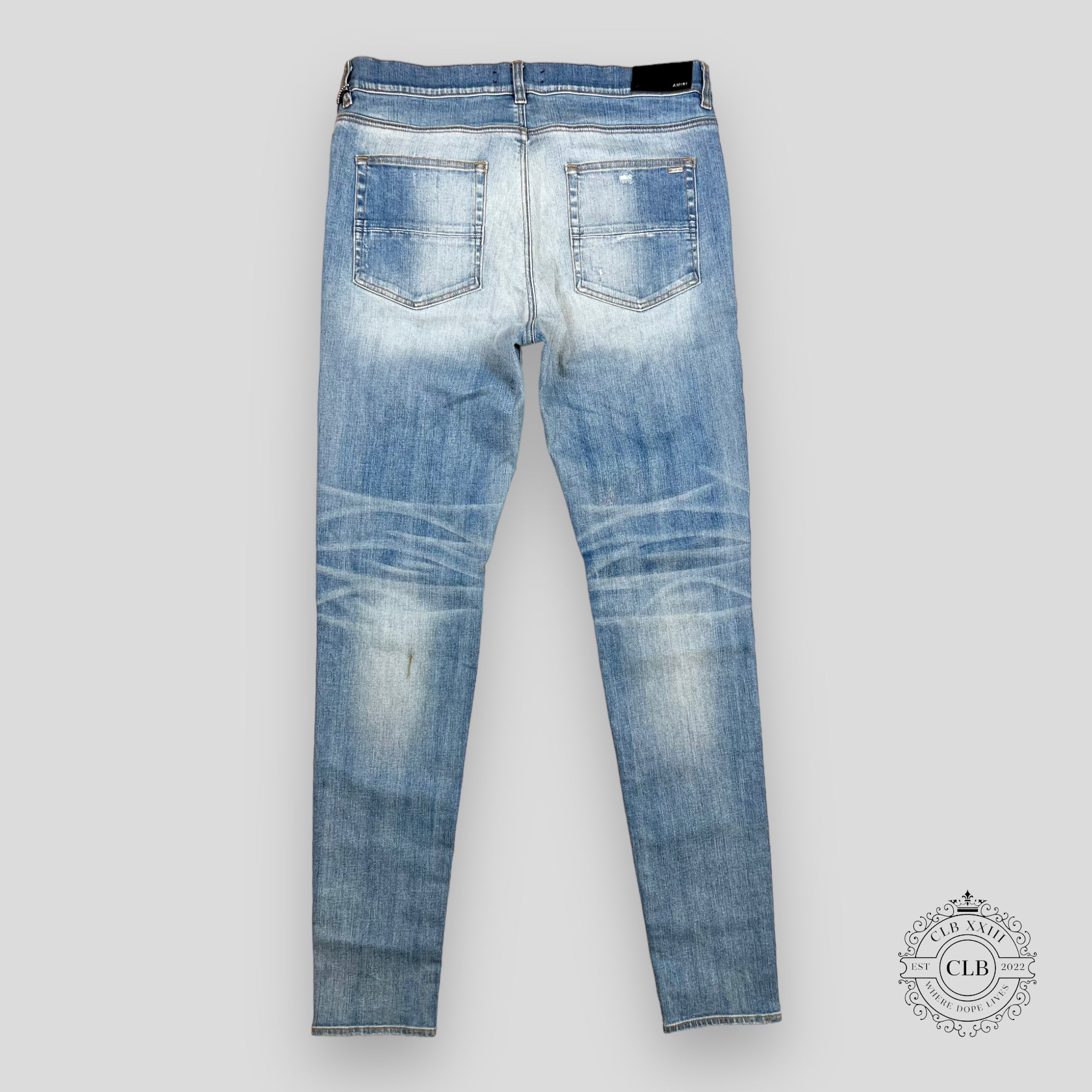 AMIRI PLAID THRASHER JEANS - LIGHT INDIGO