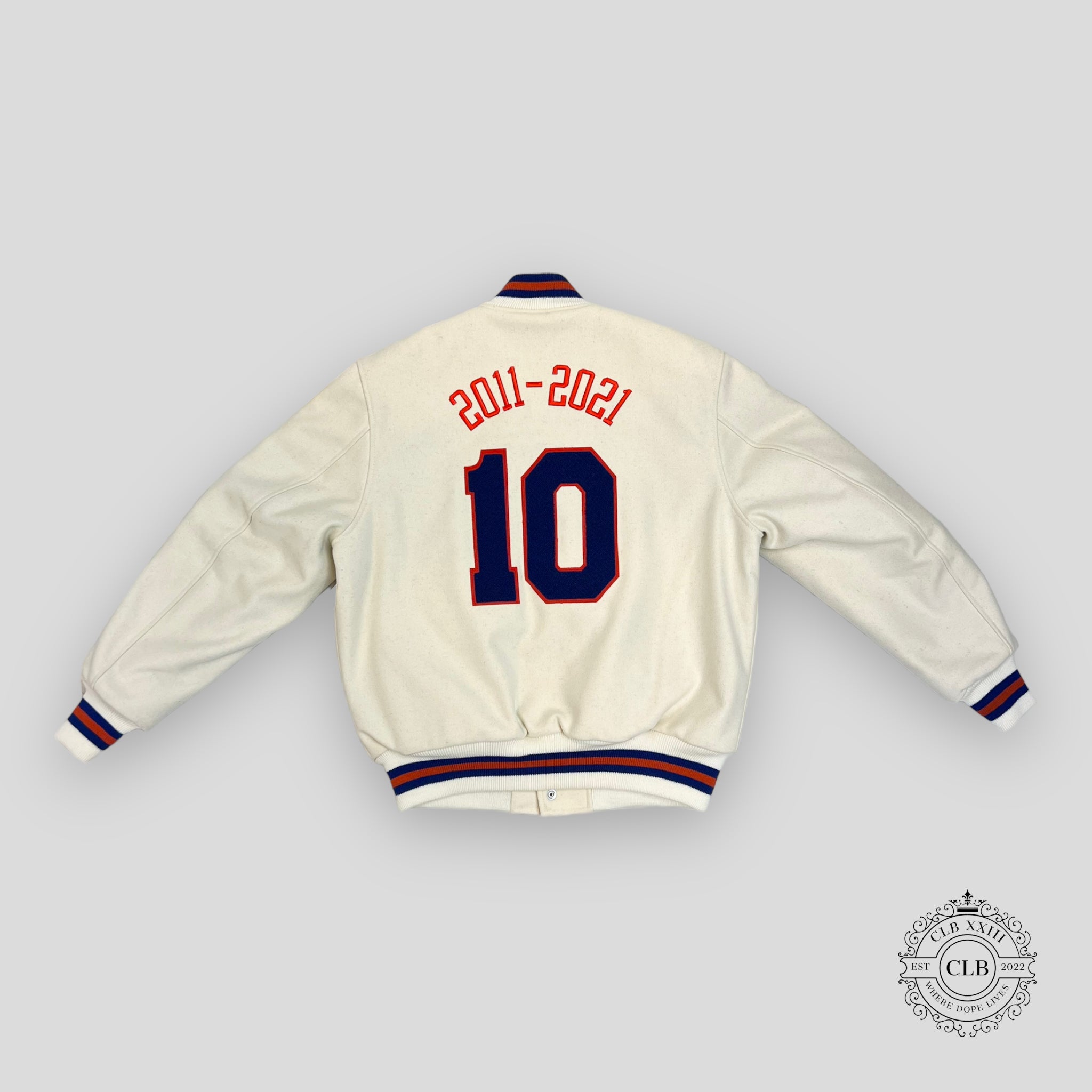 KITH GOLDEN BEAR NEW YORK KNICKS VARSITY JACKET - SANDRIFT