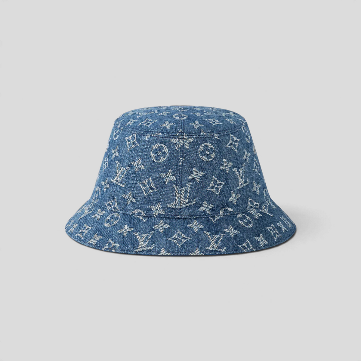 CLB XXIII Louis Vuitton reversible bucket hat in blue washed cotton denim featuring a jacquard monogram pattern.