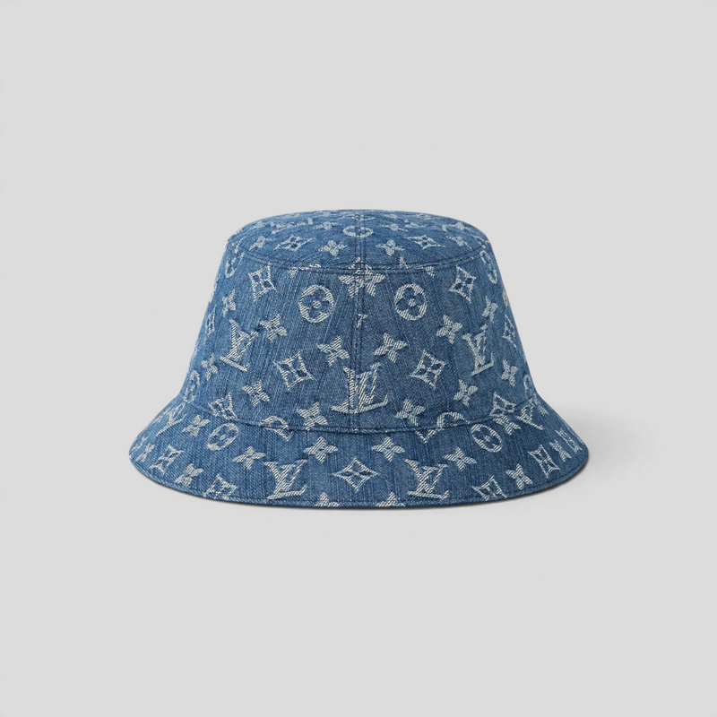CLB XXIII Louis Vuitton reversible bucket hat in blue washed cotton denim featuring a jacquard monogram pattern.