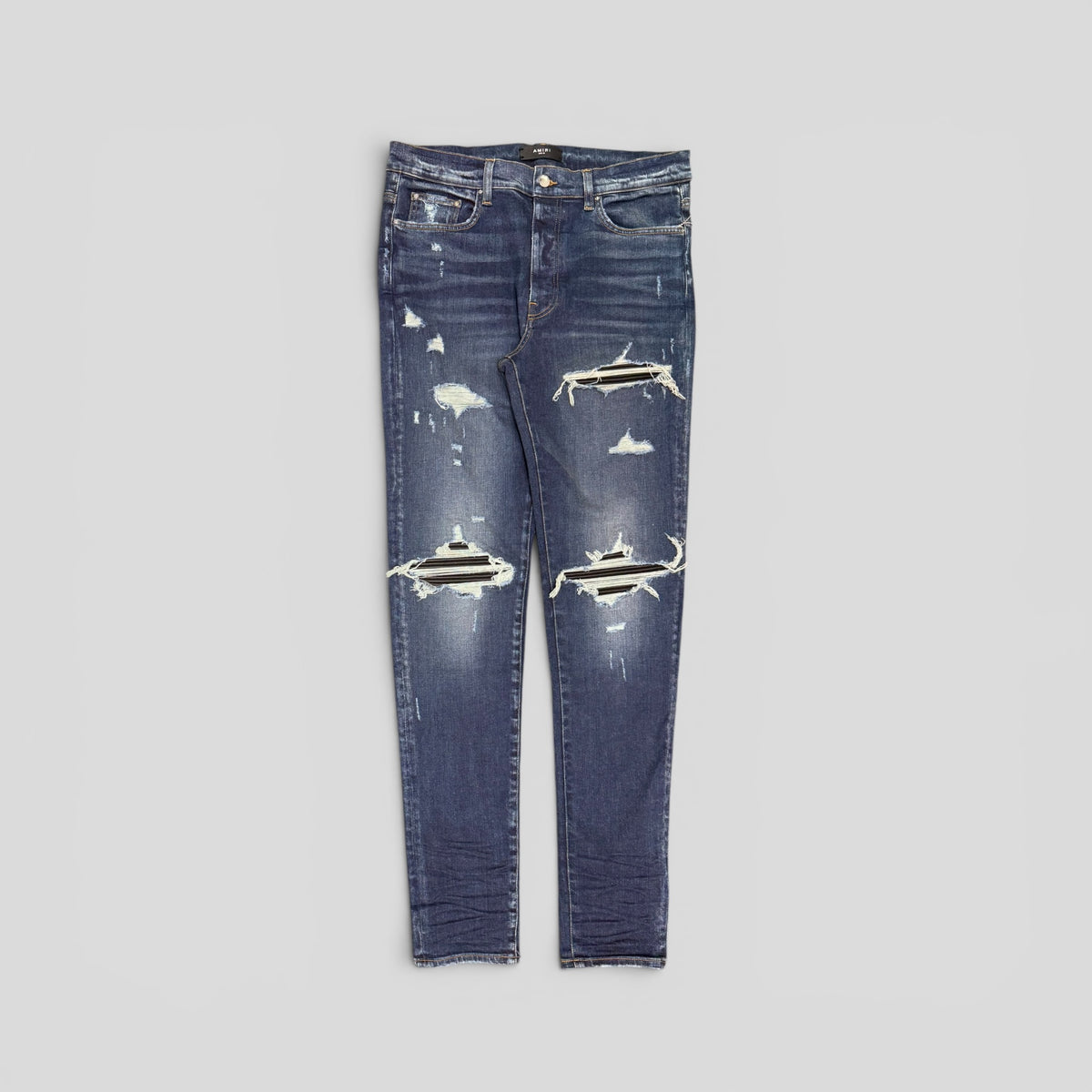 Amiri MX1 Leather Patch Jeans in Deep Classic Wash