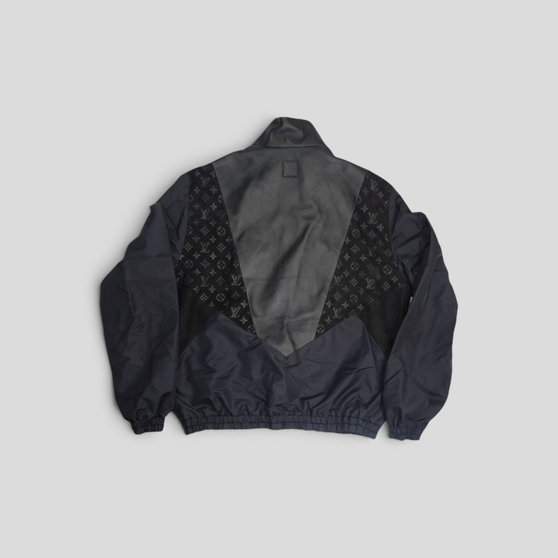 CLB XXIII Louis Vuitton black track top featuring lamb leather and monogram polyamide panels in a back view