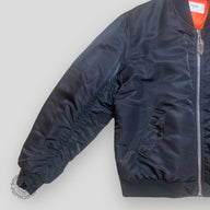 Celine Homme Oversized Chain Logo Bomber in Black