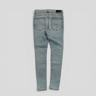 Amiri Pajama Art Patch Jeans in Light Vintage