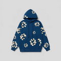CLB XXIII Denim Tears x CPFM navy hoodie featuring a white floral wreath graphic print and a spacious front pocket.