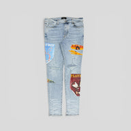 Amiri Playboy Magazine Skinny Jeans in Light Wash