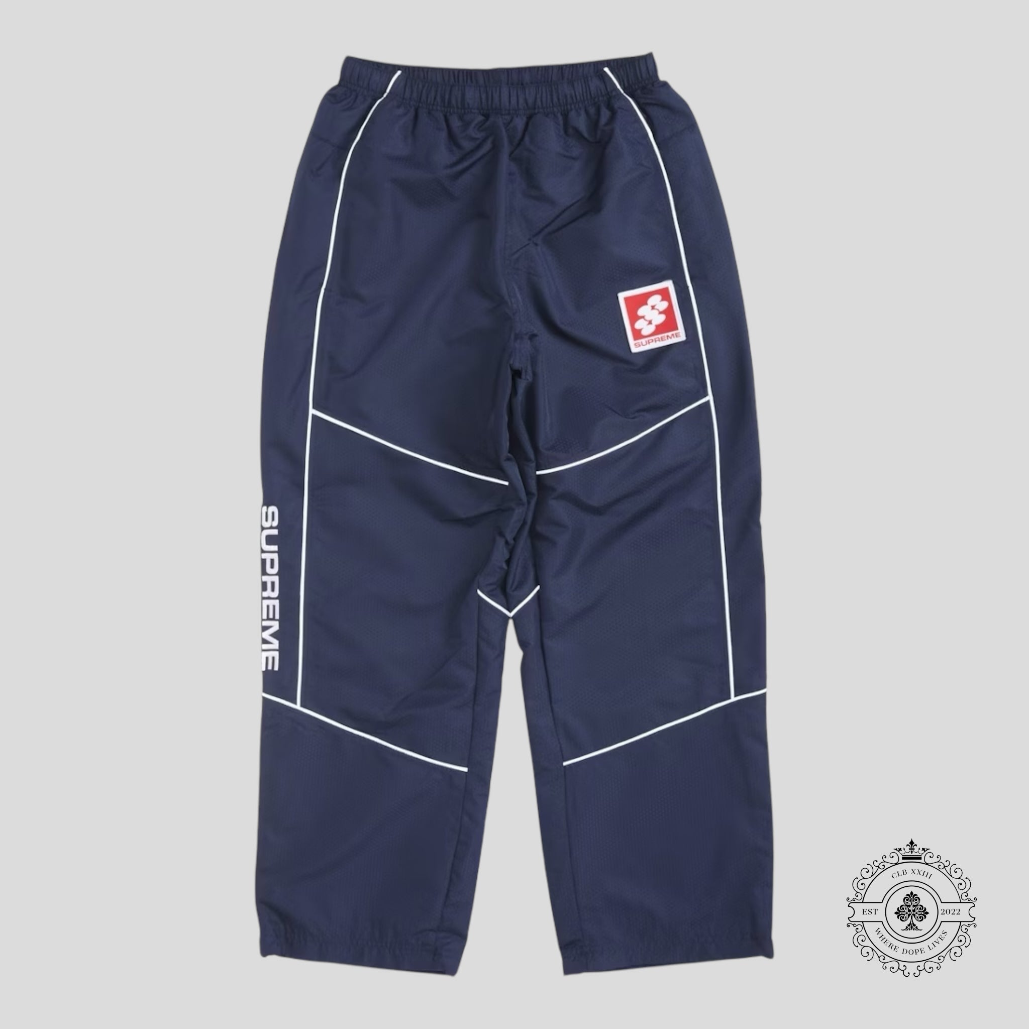 Supreme Reflective Piping Track Pant in Navy