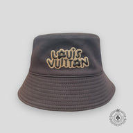 Louis Vuitton Monogram Craggy Reversible Bucket Hat in Brown
