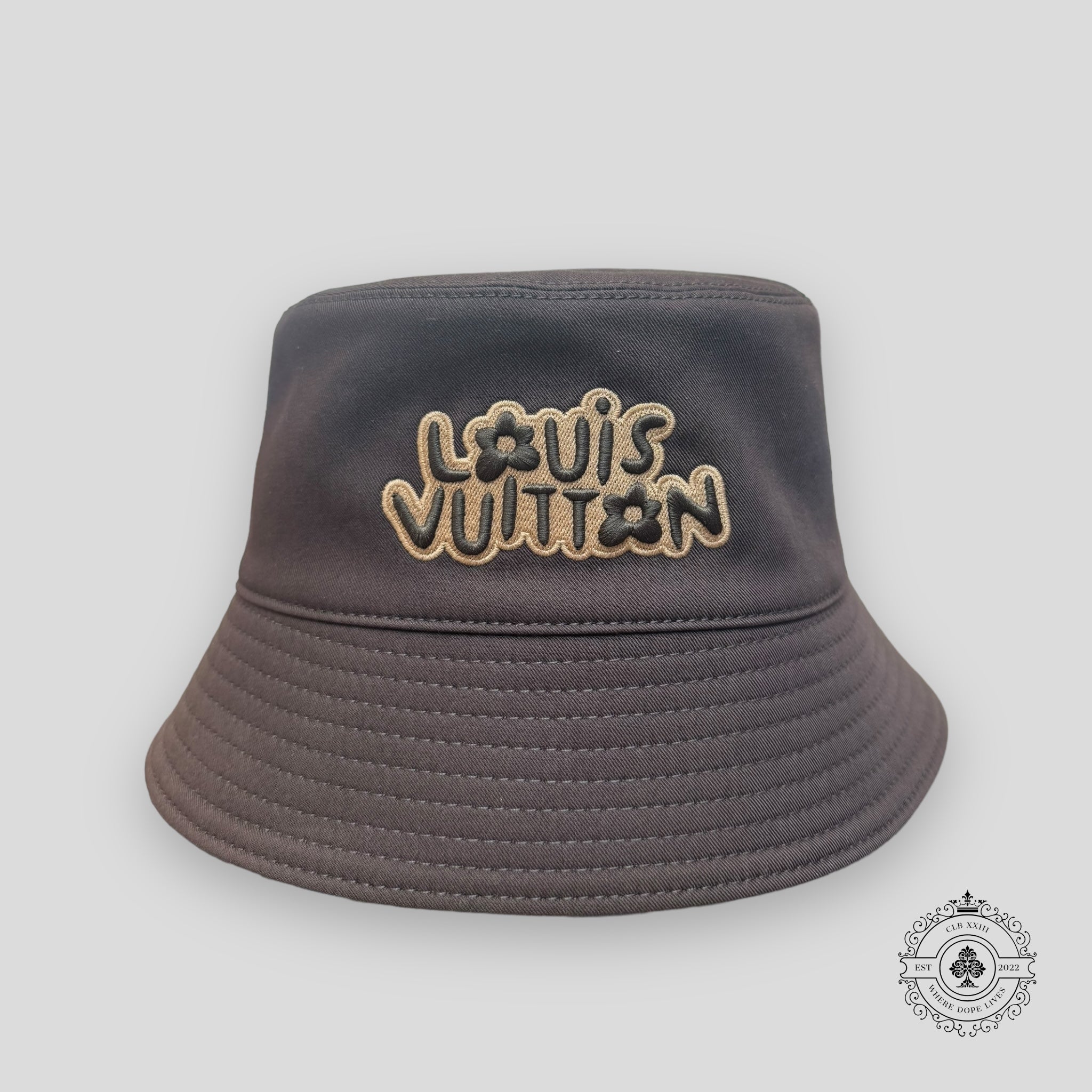 Louis Vuitton Monogram Craggy Reversible Bucket Hat in Brown
