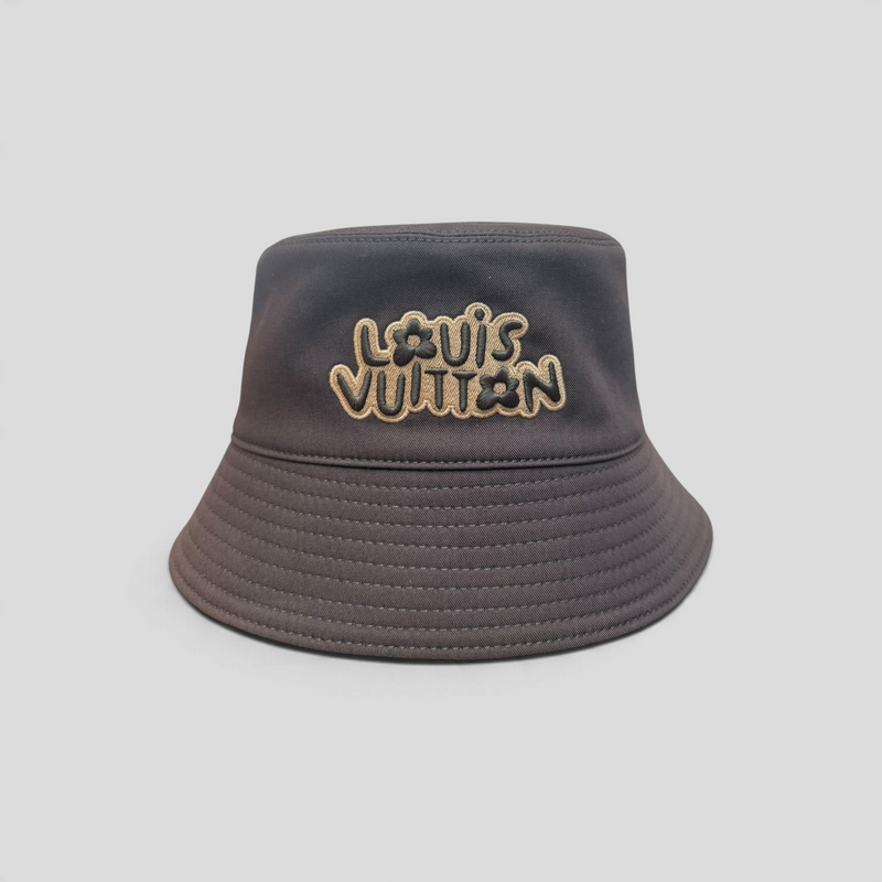 CLB XXIII Louis Vuitton brown cotton bucket hat featuring the Craggy Monogram logo embroidery in cream and black.
