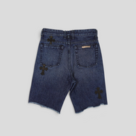 CLB XXIII Chrome Hearts dark wash denim shorts with black leather cross patches and raw hem back view