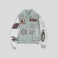 CLB XXIII Louis Vuitton Studios blue wool and calfskin varsity jacket with embroidered patches and snap button closure