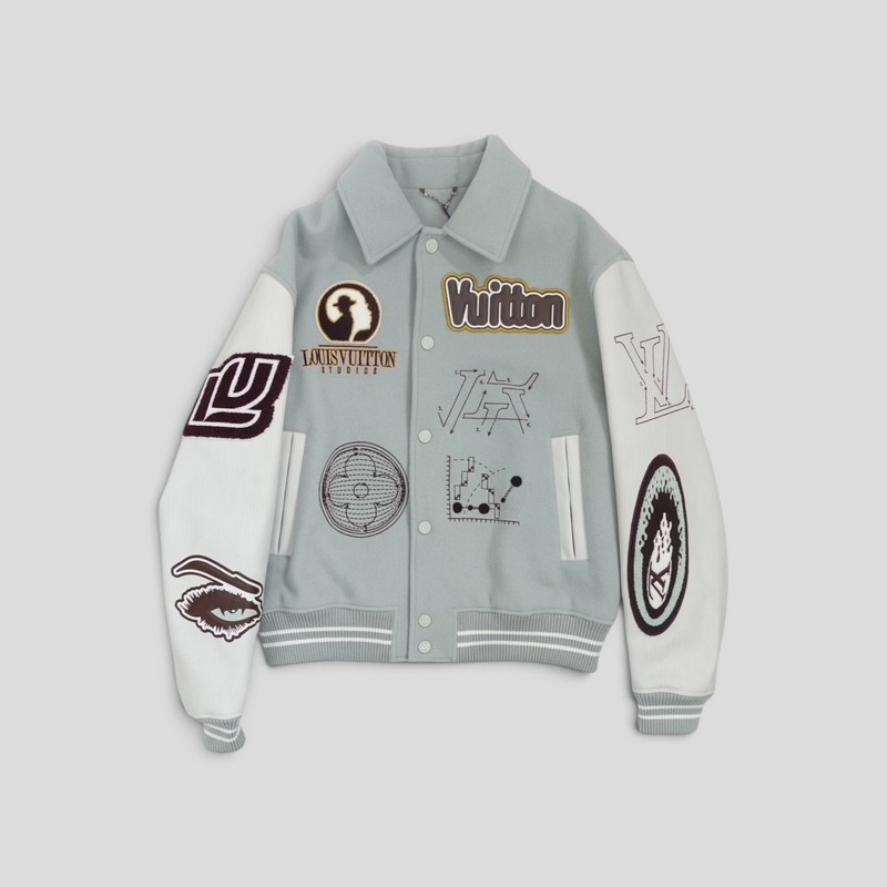 CLB XXIII Louis Vuitton Studios blue wool and calfskin varsity jacket with embroidered patches and snap button closure