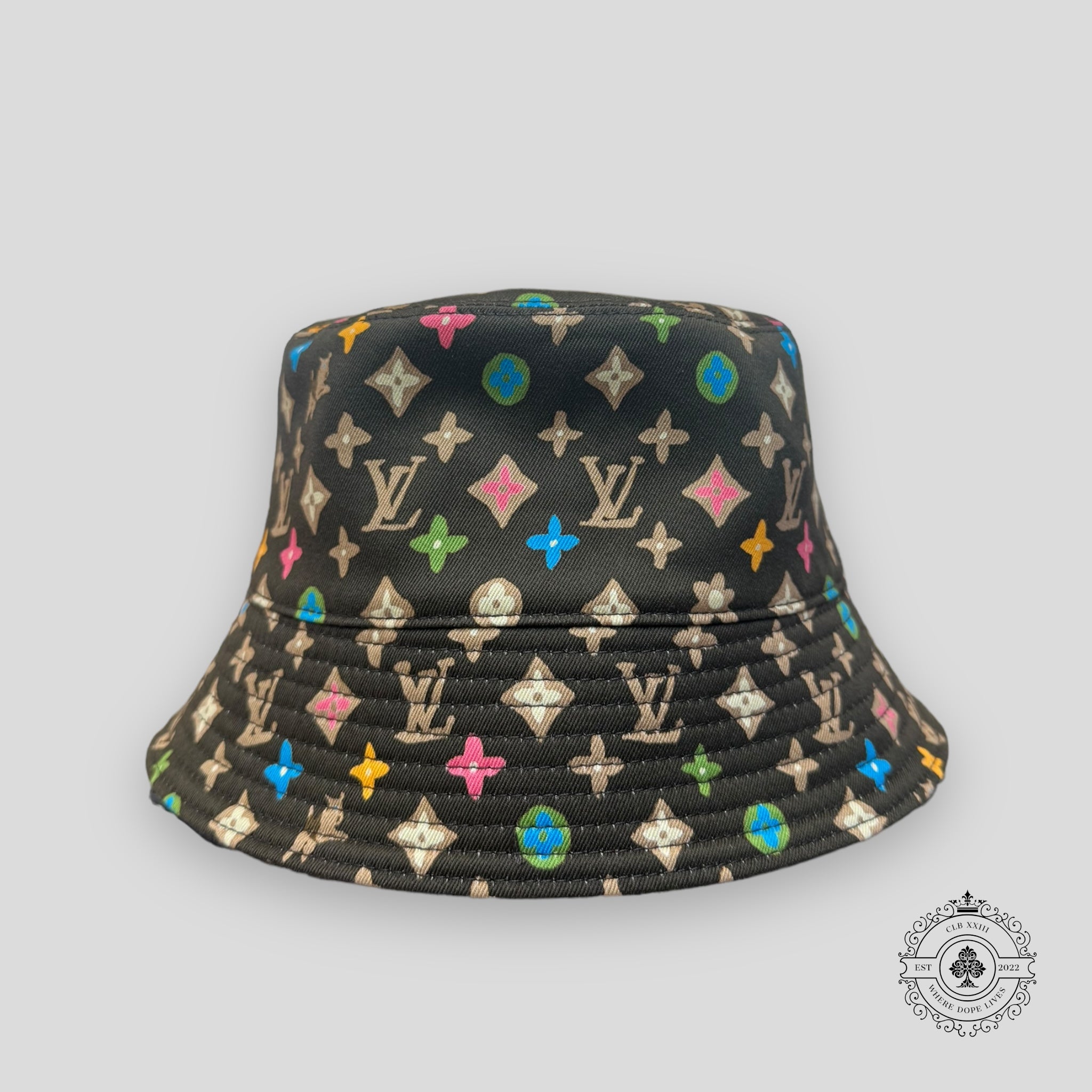 Louis Vuitton Monogram Craggy Reversible Bucket Hat in Brown