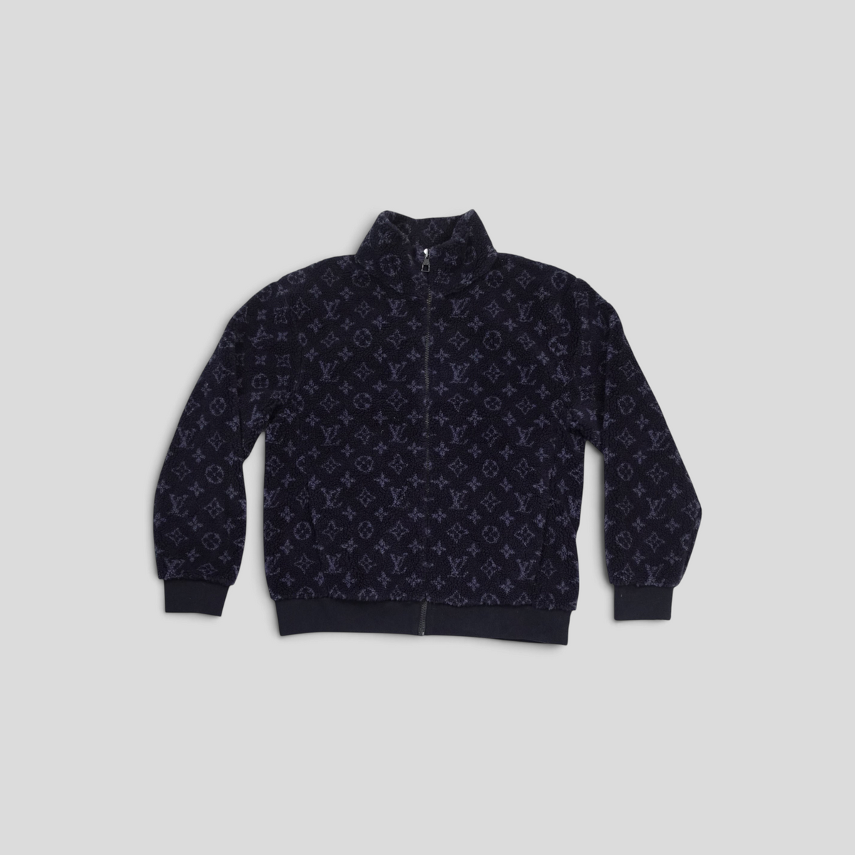 CLB XXIII navy blue Louis Vuitton monogram fleece jacket with a high collar and full zip closure.