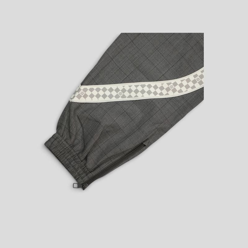 CLB XXIII Louis Vuitton grey wool track pants featuring a checkered side stripe and zippered ankle cuffs