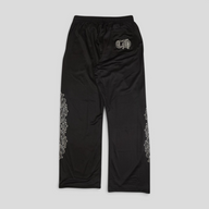 CLB XXIII Chrome Hearts black nylon mesh pants featuring white floral side detailing and CH logo on the back pocket
