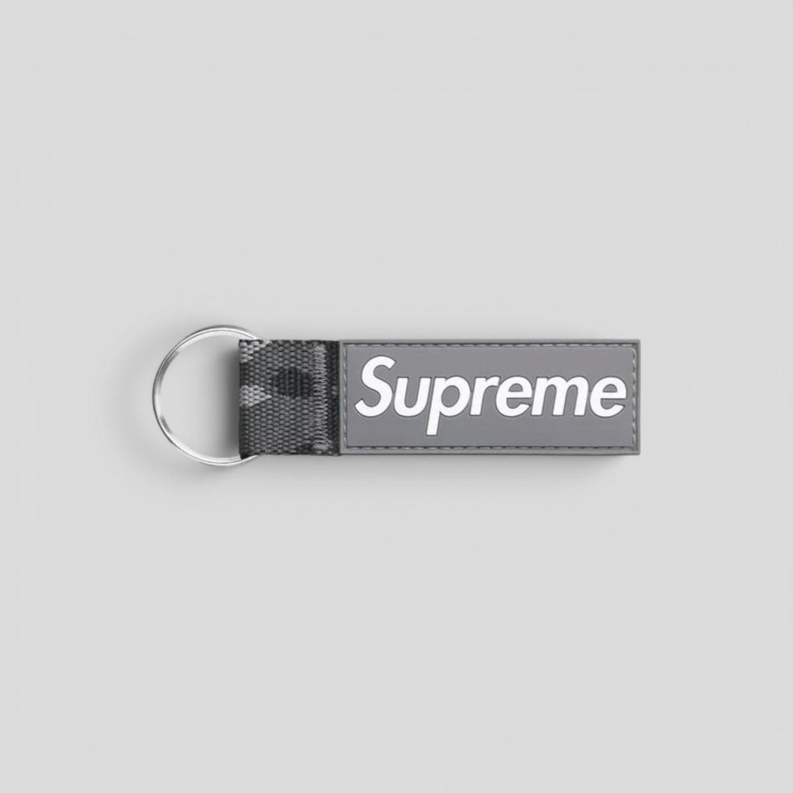 Supreme Webbing Keychain in Snow Camo