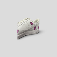 CLB XXIII Matty Boy custom white Air Force 1 low-top sneakers featuring purple hand graphic prints.