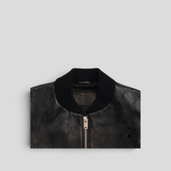 CLB XXIII Gucci black leather bomber jacket featuring embossed GG monogram pattern and ribbed collar