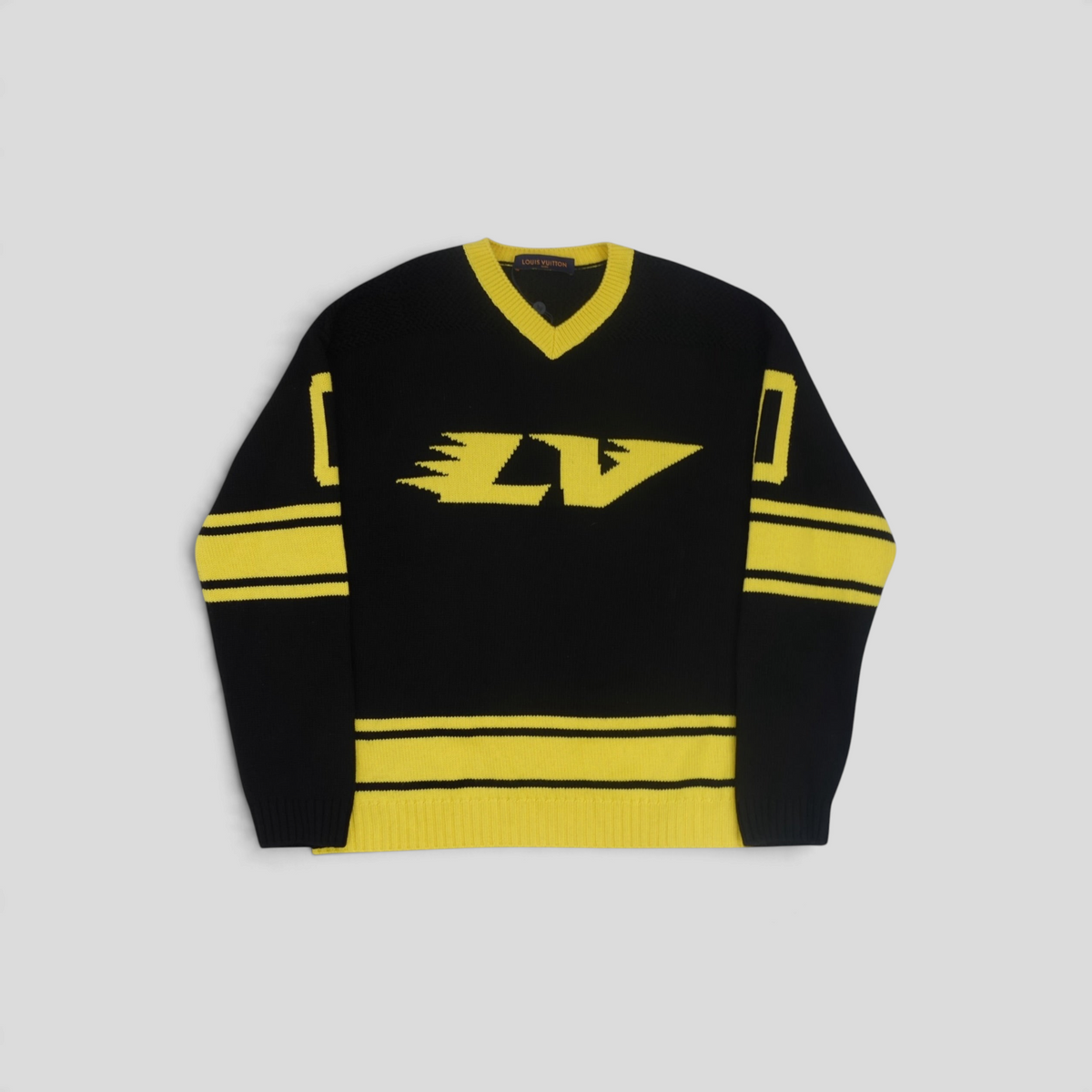 CLB XXIII Louis Vuitton black and yellow wool-blend intarsia football sweater with V-neck and LV logo graphic