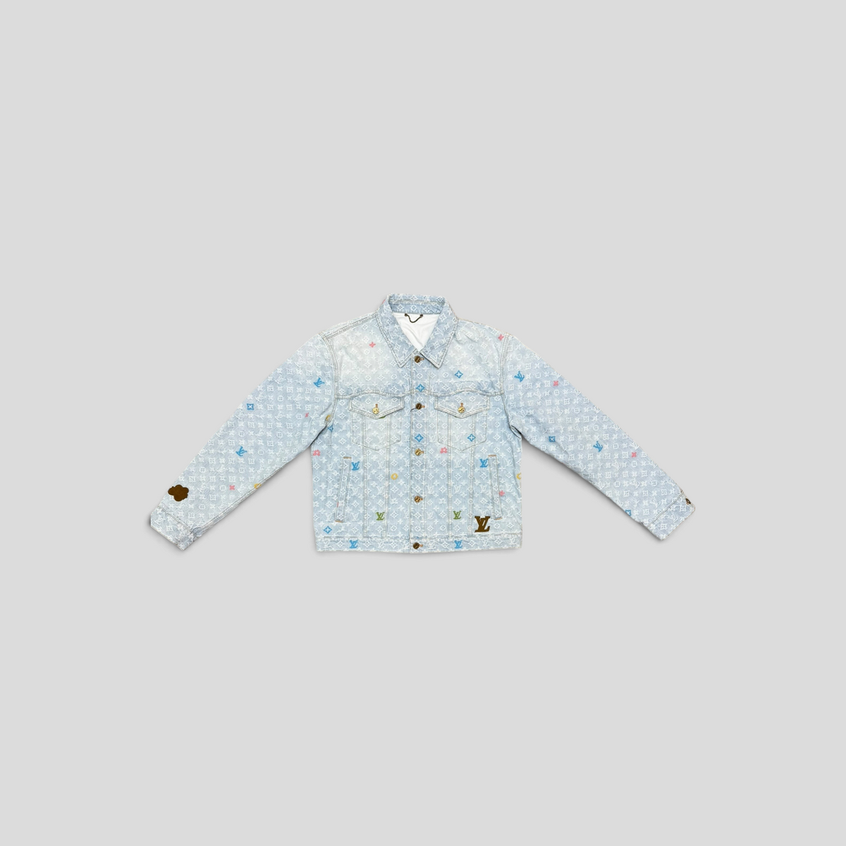 CLB XXIII Louis Vuitton light wash denim jacket with multicolor Monogram Craggy motif and suede signature patches.