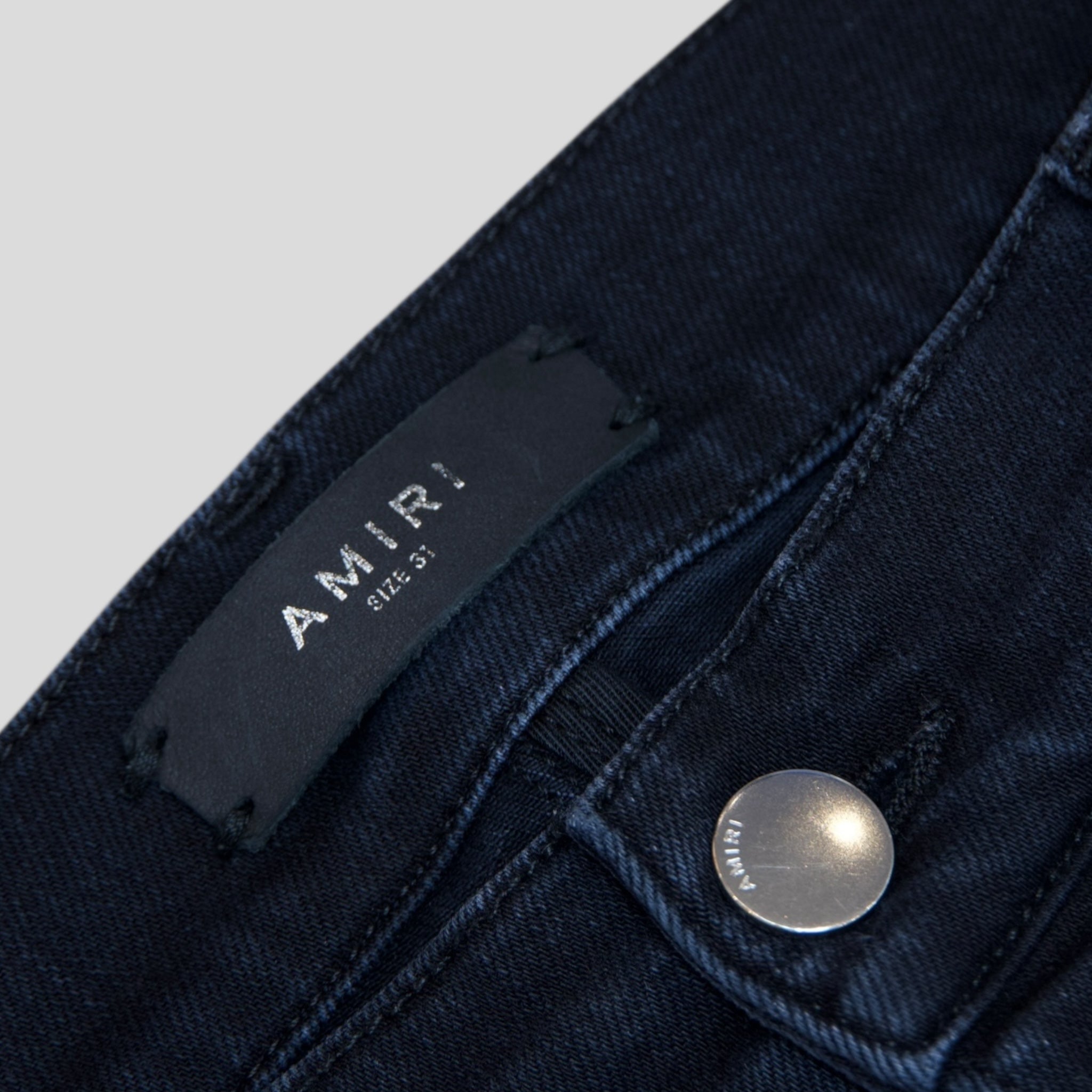 Amiri MX1 Thrashed Denim in Aged Black