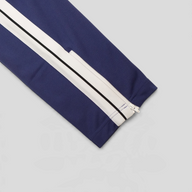 CLB XXIII Palm Angels navy polyester track pants featuring a white side stripe and ankle zipper detail