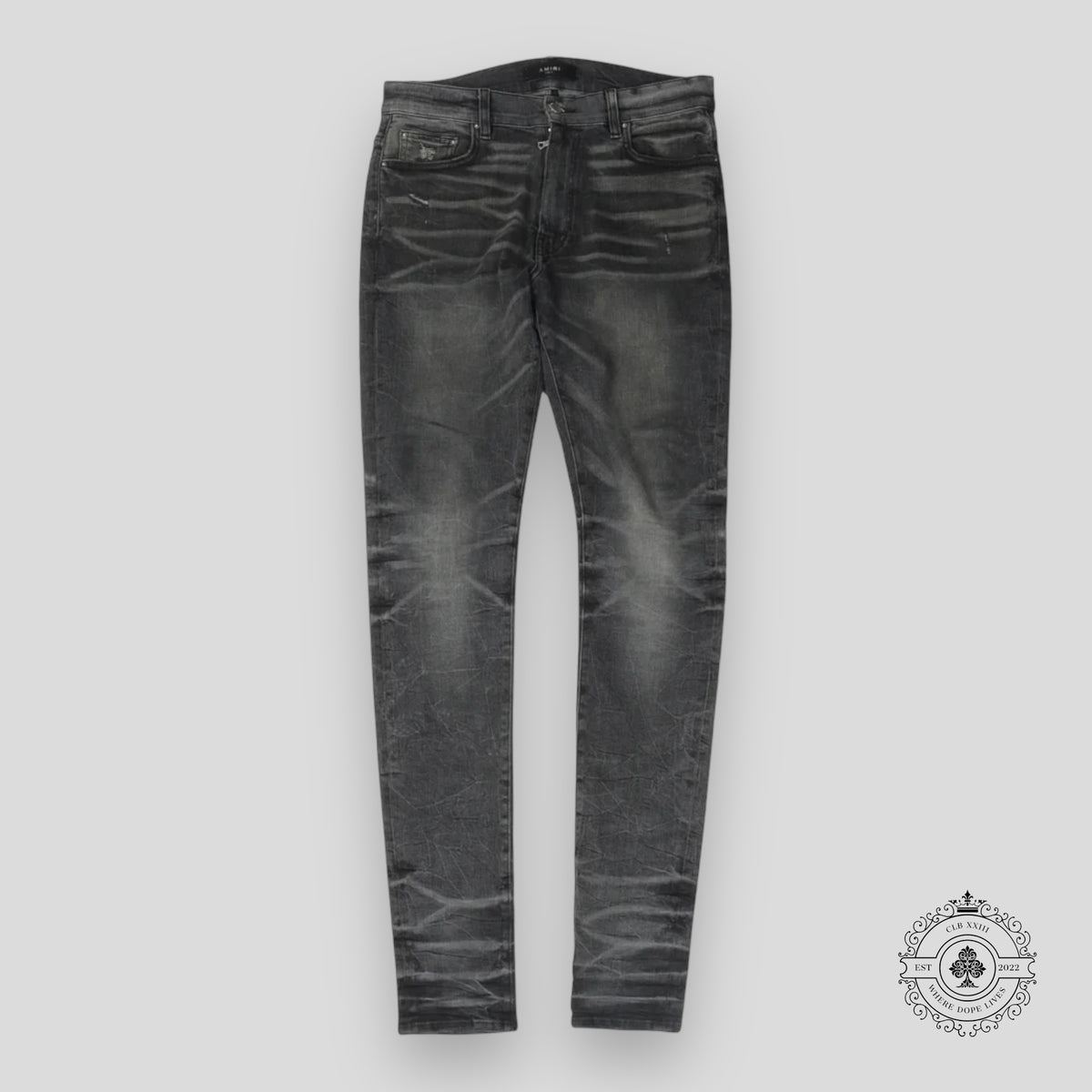 Amiri Faded Denim Jeans in Grey