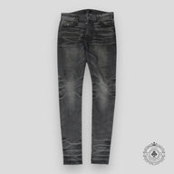 Amiri Faded Denim Jeans in Grey
