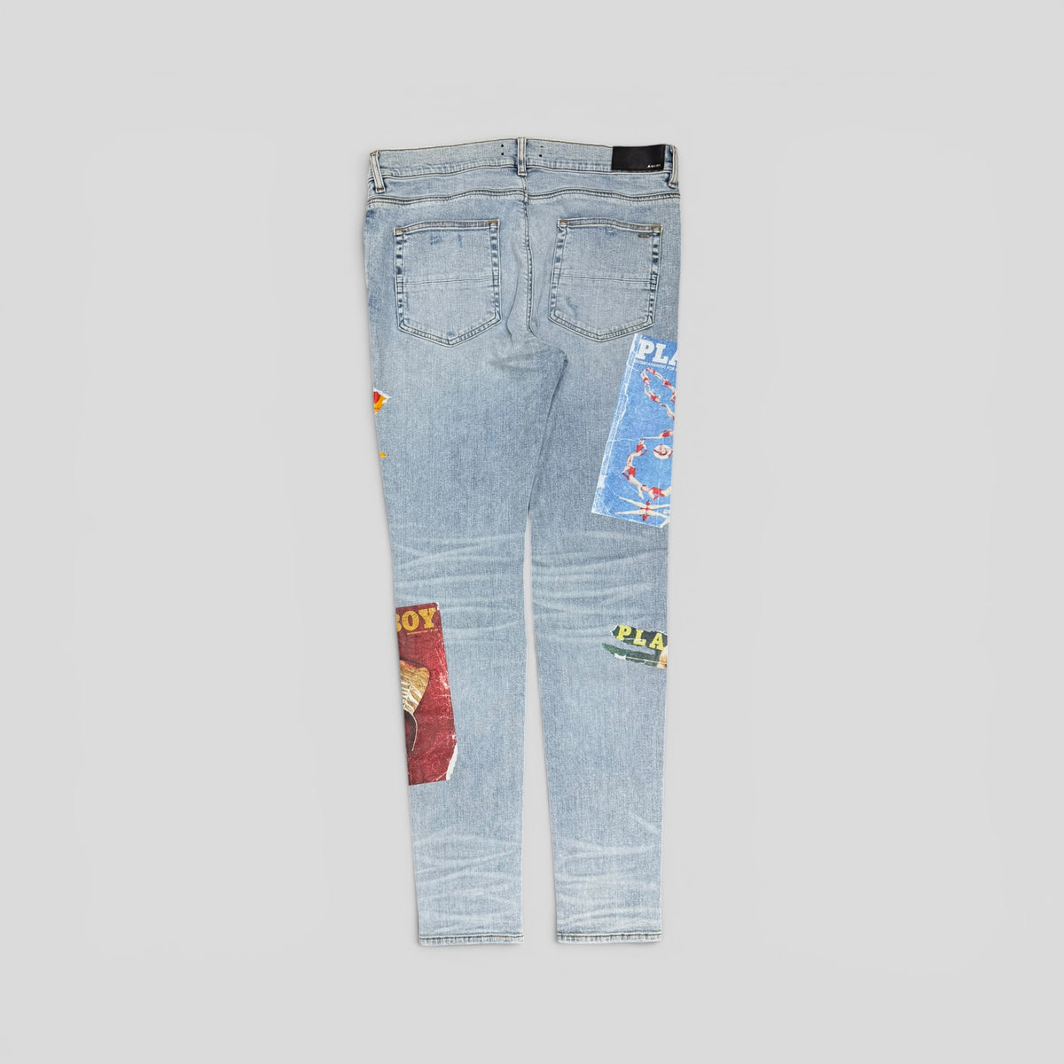Amiri Playboy Magazine Skinny Jeans in Light Wash