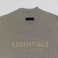 Fear of God Essentials V-Neck Tee in Heather Grey