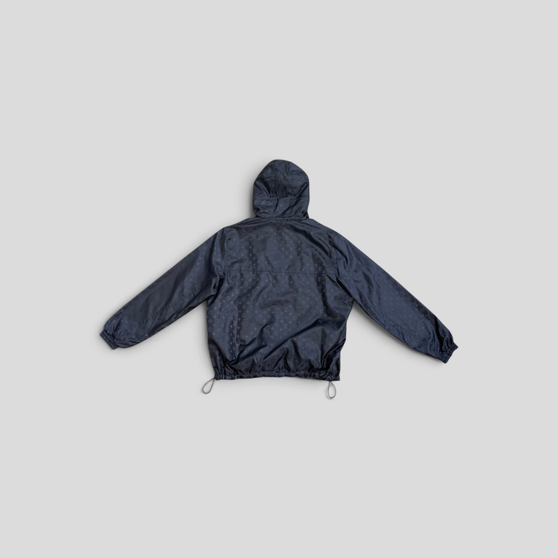 CLB XXIII Louis Vuitton black monogram reversible polyamide windbreaker with hood and drawstring hem, back view.