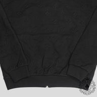 Louis Vuitton Embossed Monogram Tracktop in Black