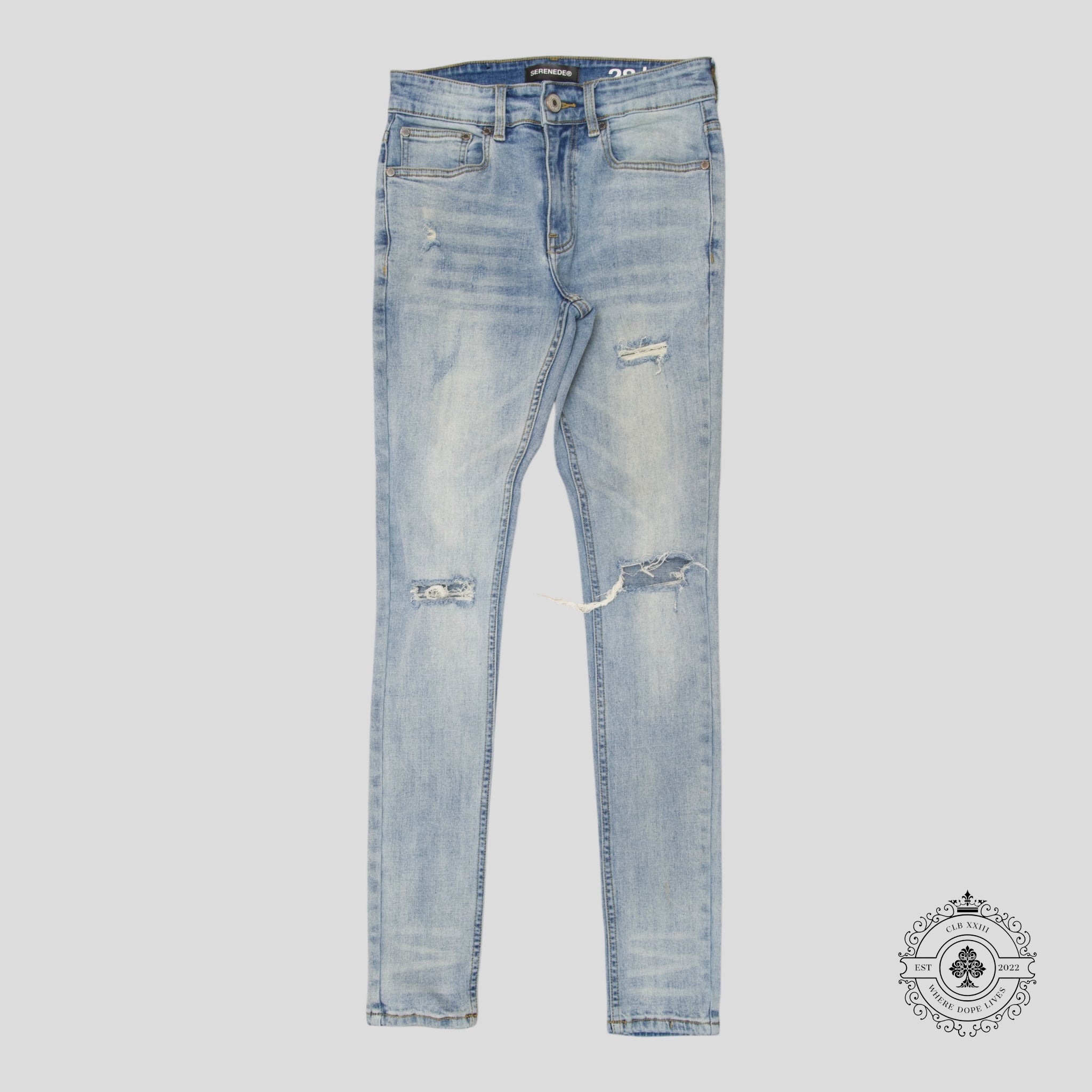 Serenede Distressed Fitted Denim Jeans	in Light Wash