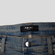 AMIRI PLAID THRASHER JEANS - CLAY INDIGO