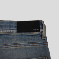AMIRI PLAID THRASHER JEANS - CLAY INDIGO