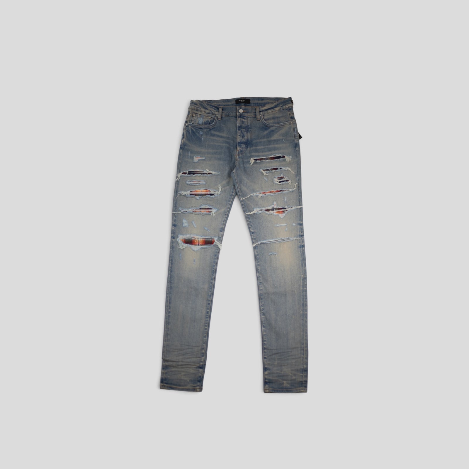 AMIRI PLAID THRASHER JEANS - CLAY INDIGO