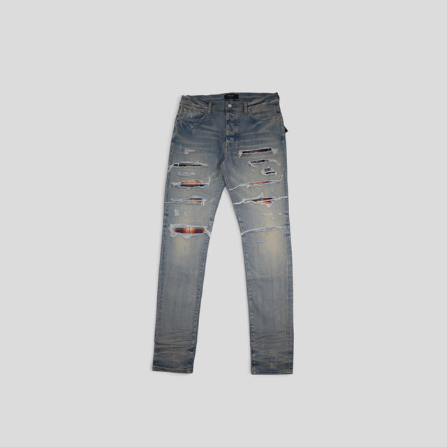 AMIRI PLAID THRASHER JEANS - CLAY INDIGO